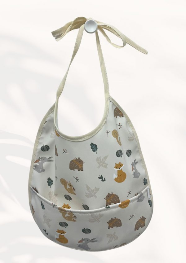 BABERO IMPERMEABLE +BOLSILLO - Modelo ANIMALES